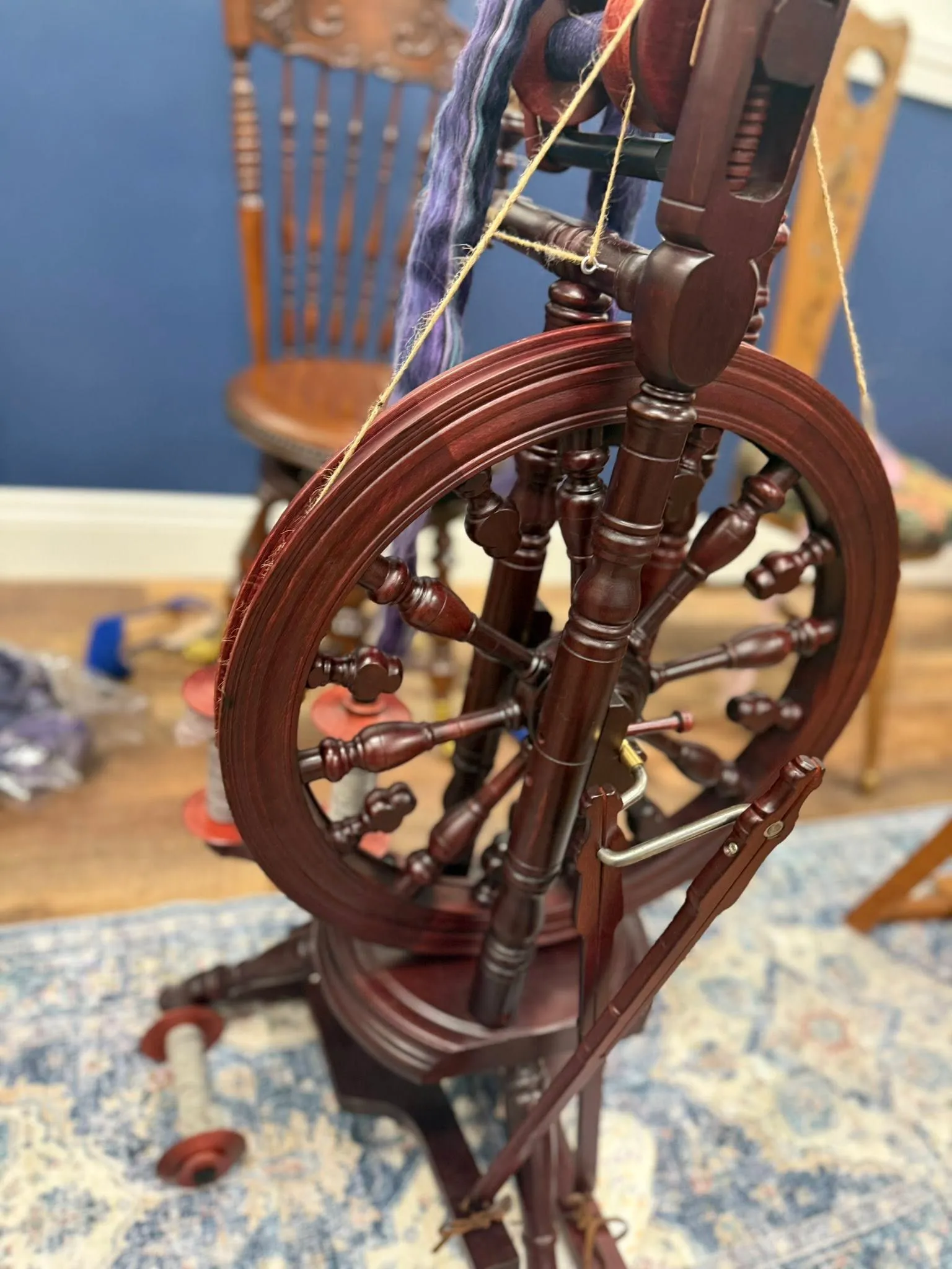 A hand-made wooden spinning wheel